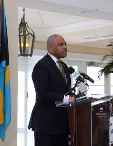 Carnival Corp. President and CEO Arnold Donald at Grand Bahamas cruise port signing ceremony. 