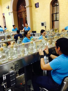 Patrón tequilas are hand corked and hand labeled. Each worker inspects the bottle, and the work of the previous worker – 60 hands touch every bottle. 
