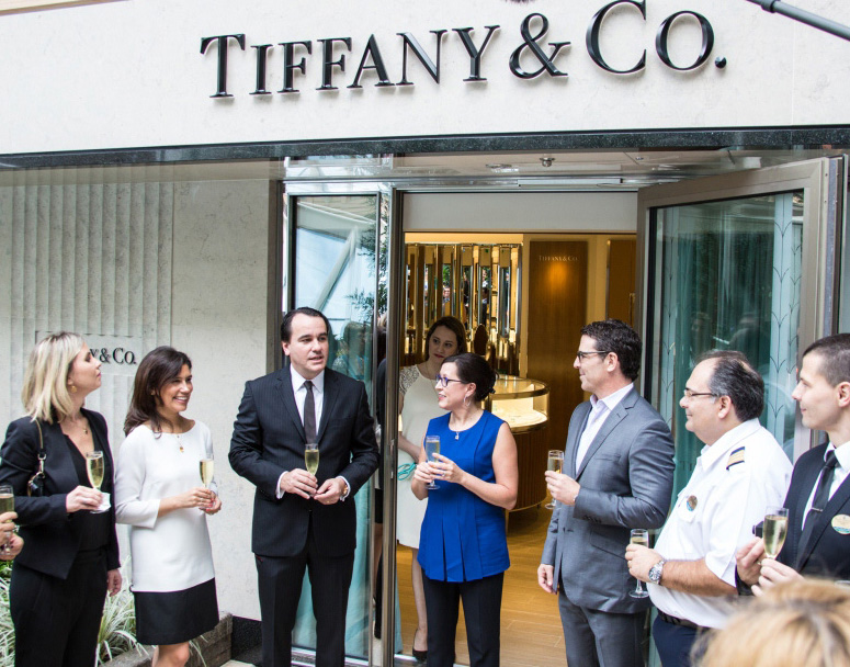 Luciano Rodembusch, VP, Latin America at Tiffany & Co., Beth Neumann, president, Starboard Cruise Services and Mark Tamis, SVP, Hotel Operations, Royal Caribbean International, cut the ribbon to the first Tiffany & Co. boutique at sea. 