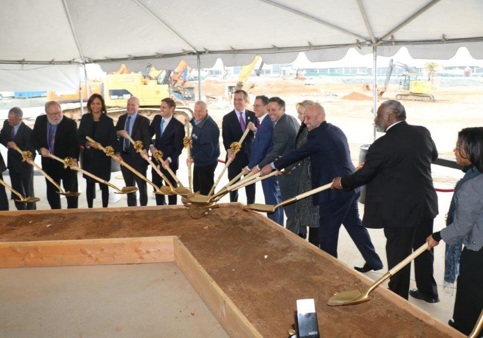 City and airport officials, including Mayor Eric Garcetti, center, marked the groundbreaking of the Midfield Satellite Concourse on February 27.